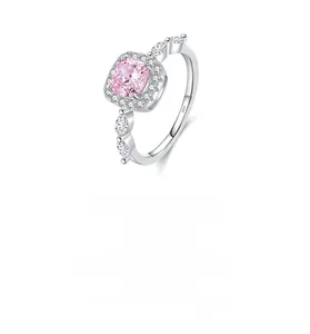 Macro detail of S925 silver ring featuring pink square crystal and marquise zircon accents