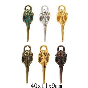Vintage alloy bird skull charms in six metallic finishes, size 40x11x9mm for DIY jewelry