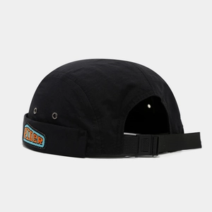 Detail of black brimless cap with RIDER patch and adjustable strap on ripstop fabric