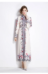 Detail of floral maxi dress featuring a chic stand collar and vintage button accents