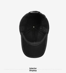 Detailed interior view of winter wool baseball cap featuring warm ear flaps and reinforced stitching