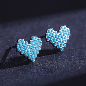 Retro S925 silver heart stud earrings with turquoise pixel art inlay on dark texture