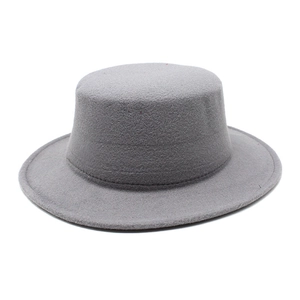 Detail of light grey wool felt flat top boater hat with smooth brim and vintage texture