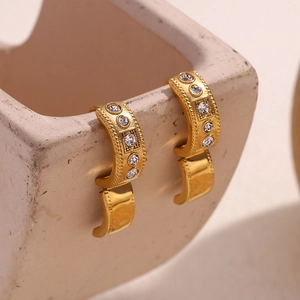 18K gold plated stainless steel twist earrings with clear crystals on ceramic edge
