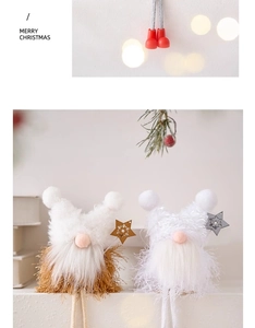 Close-up of plush Christmas gnomes with wooden stars and soft faux fur textures