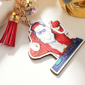 DJ Santa Claus keychain with red tassel and star ornament for Christmas bags