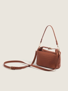 Brown woven leather crossbody bag with adjustable shoulder strap and gold hardware