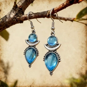 Bohemian silver earrings with blue moonstone in round and teardrop shapes on branches