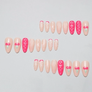 Uñas postizas 3D de cereza y textura concha en rosa con diseño forma almendra