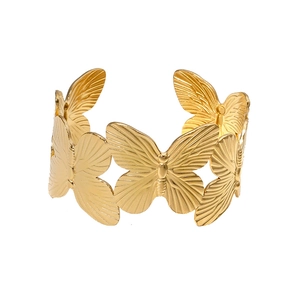 Elegant gold butterfly open cuff bracelet with detailed realistic wing texture