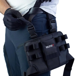 Tactical black oxford fabric tool waist bag with adjustable leg straps and buckles