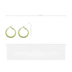 Detail view of light green geometric hoop earrings with precise size measurements