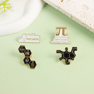 Science enamel pins featuring Dopamine, Pi, Genius and Caffeine chemical structures