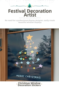 Close-up of abstract Christmas tree window sticker with Merry Christmas typography