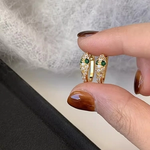 Vintage gold S925 silver snake hoop earrings with white zircon stones and green gem eyes