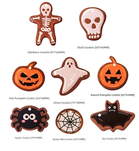 Detailed flat lay of 8 Halloween cookie-style charms with varied sizes on white background