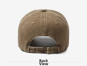 Detail view of the washed cotton baseball cap featuring an adjustable brass metal buckle