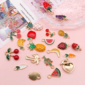 Colorful enamel fruit pendants including strawberry and banana for DIY jewelry making