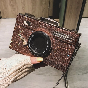 Sparkly brown sequin camera-shaped crossbody bag with chain strap and crystal accents