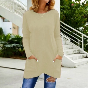 Close-up of casual long sleeve t-shirt with functional side pockets in beige khaki color