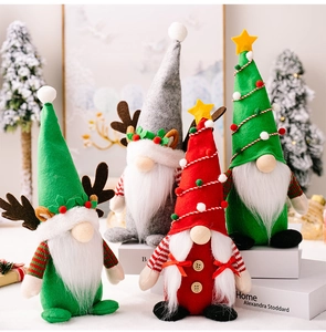 Detail of Christmas gnomes with antler hats and festive tree hats in a cozy holiday setting