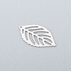 Macro shot of a hollow stainless steel leaf pendant for DIY jewelry design