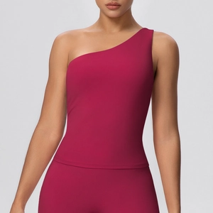Detail of a magenta one-shoulder sports top with high-stretch brushed fabric for yoga