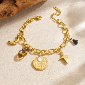 Bohemian gold stainless steel charm bracelet with star, moon and leopard print pendants
