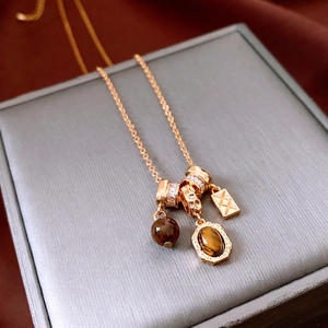 Tiger eye stone beaded adjustable necklace with gold charms and quilted pendant