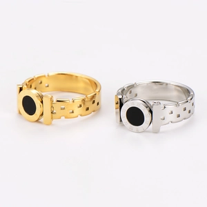 Polished gold and silver stainless steel rings with black Roman numeral circular inlay