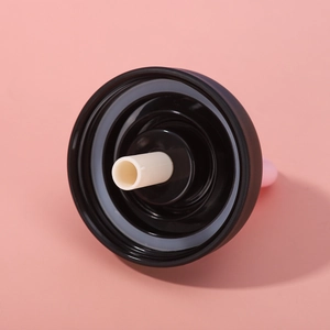 Macro detail of black insulated bottle lid with internal straw connector and sealing ring