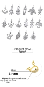 Macro shot of 18K gold-plated copper charms with sparkling zircon stone inlay