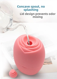 Close-up of the water filling hole and sealing lid on a pink rose silicone ice face roller