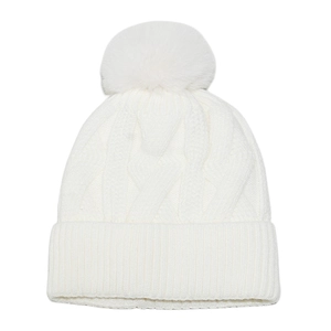 Close-up of white cable-knit beanie with soft pom-pom and ribbed cuff details