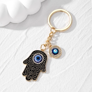 Porte-clés main de Fatma vintage avec pendentif œil bleu et détails en strass dorés