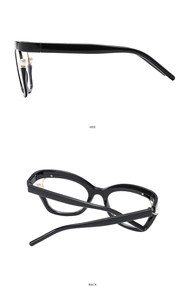 Detail of black eyeglass frames featuring elegant white pearl accents and gold metal hinges