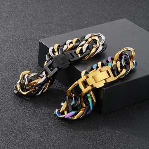 Detail of mixed-color stainless steel Cuban link bracelets with secure square clasps