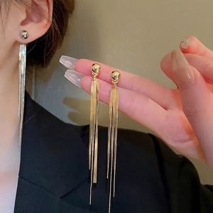 Elegant gold and silver long tassel drop earrings with sleek minimalist metal chains