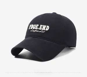 Detailed side view of black cotton baseball cap with white 3D letter embroidery