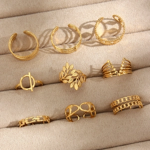 9-piece 18K gold plated adjustable open ring set featuring geometric and leaf designs
