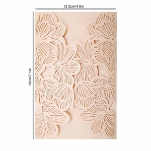 Detail of laser cut rose wedding invitation cover with dimensions 18cm x 12.5cm