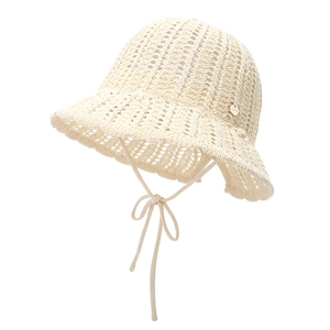 Breathable hollow knit bucket hat for women with wavy brim and chin strap in cream white