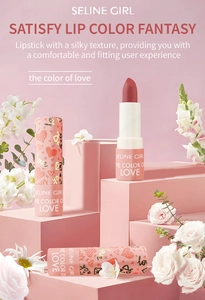 Detailed view of matte rose lipstick in pink gold-heart cases on floral display stands