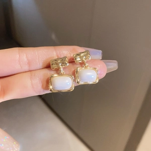 Vintage gold and white geometric square earrings with hammered texture and French style