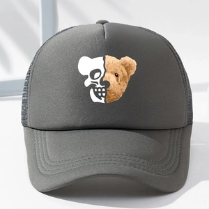 Detailed view of the dark grey mesh trucker hat featuring a split skull teddy bear print