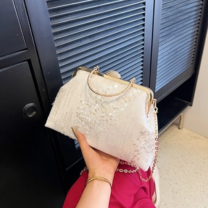 Elegant white sequin evening clutch with metal handle and pearl clasp detail