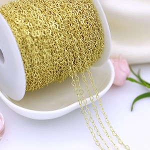 Close-up of 18K gold-plated copper heart-shaped chain roll for DIY jewelry making