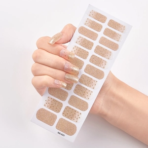 Golden glitter gradient self-adhesive nail stickers shown on a hand with SS-037 model