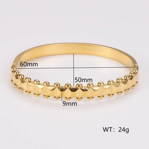 Detailed size specifications of the vintage wave rivet bangle showing 60x50mm inner diameter