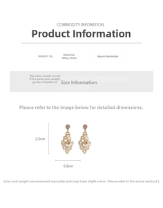 Detailed view of champagne gold leaf tassel earrings with 6.8cm length dimensions